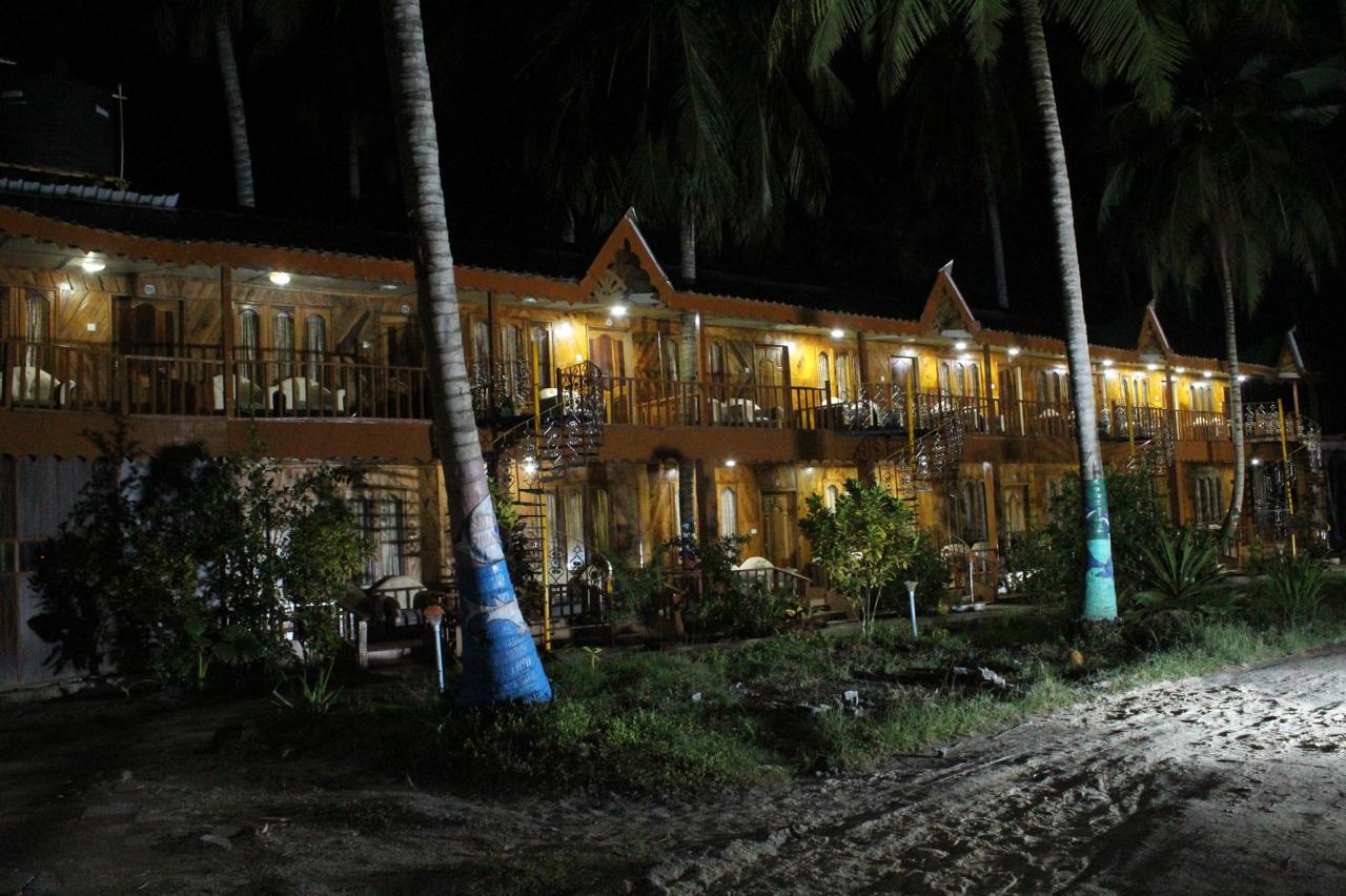 The full resort facade lit up at night