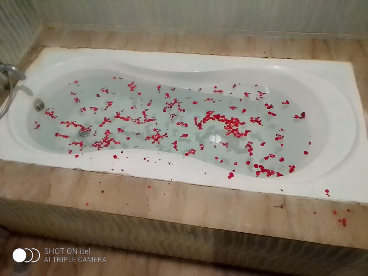 Rose-petal bath run for our guests