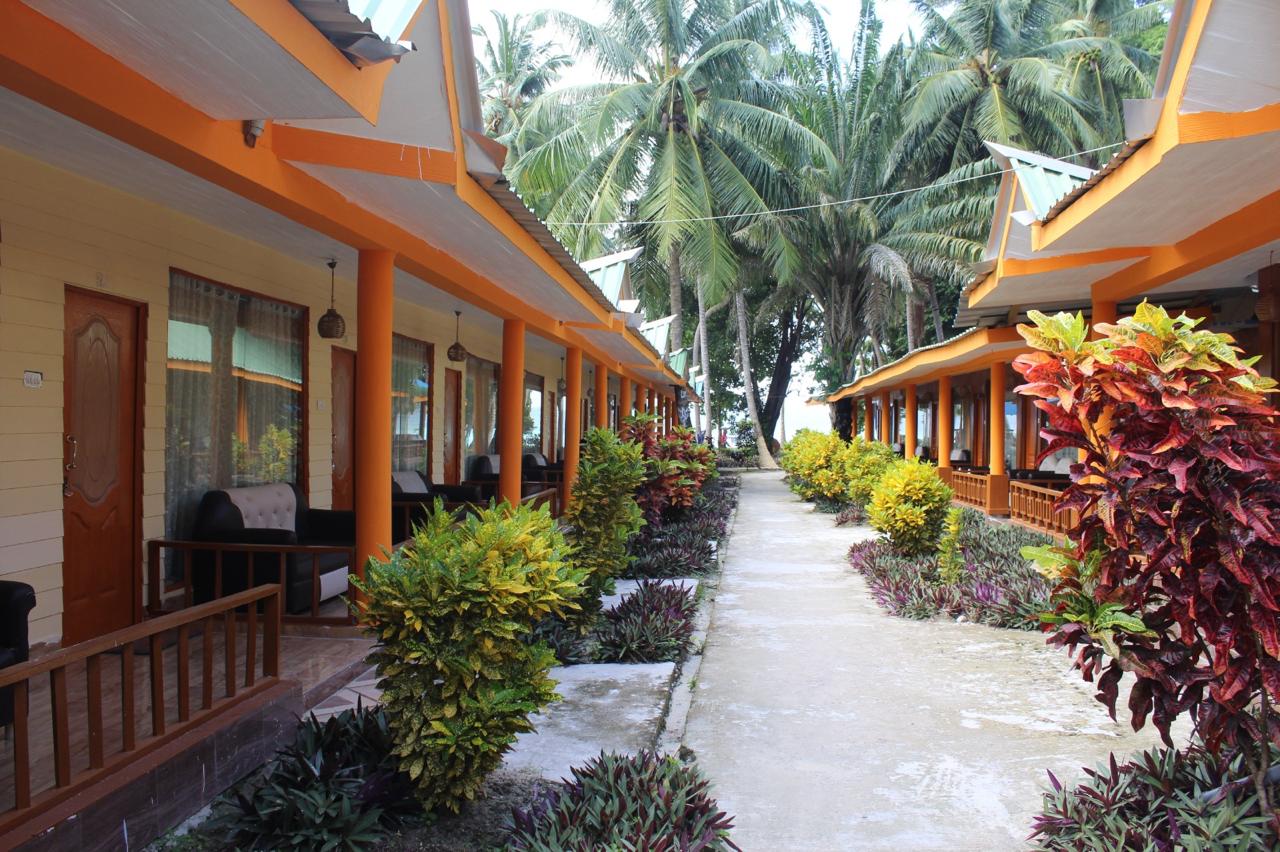 Flowering walkway between the guest cottages